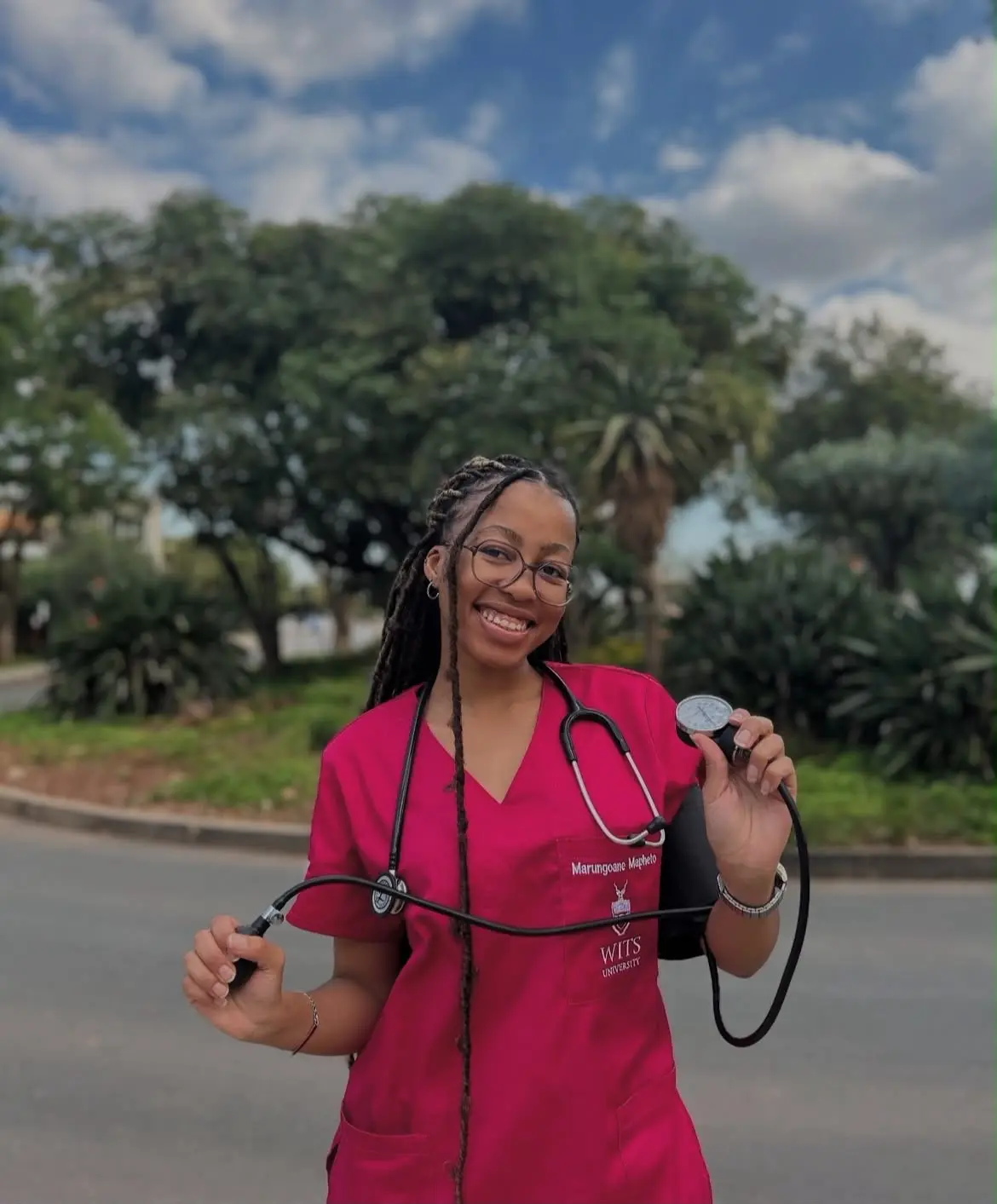 Marungoane Maphetho, third-year medical student at Wits, in scrubs with a stethoscope